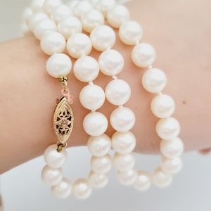 Stunning 14k genuine Cultured round pearl necklace